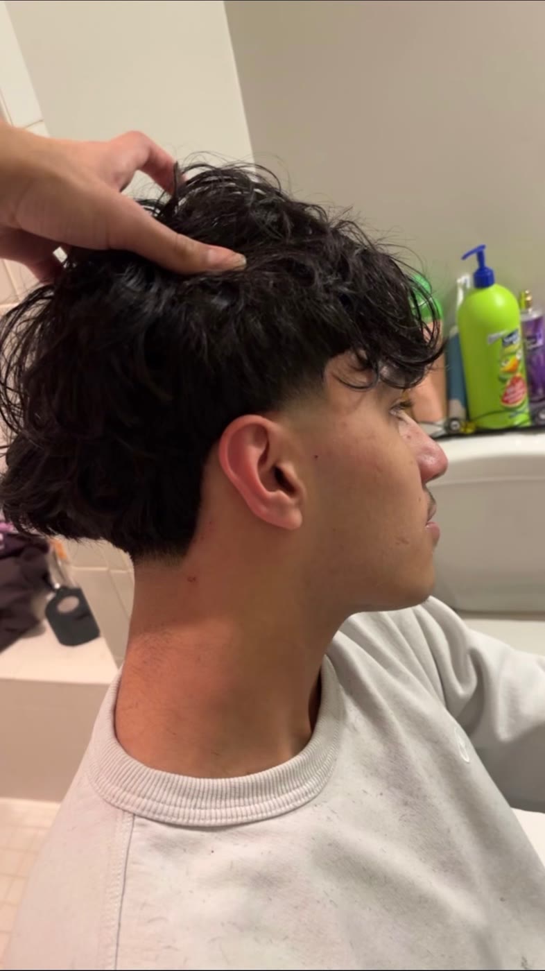 Clean taper haircut by Mblendzz barber in Ashburn, VA